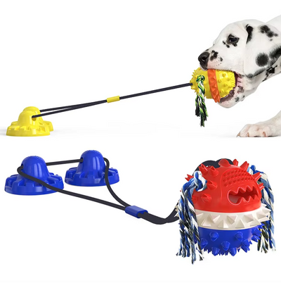 Interactive dog toy with suction cups and treat dispenser